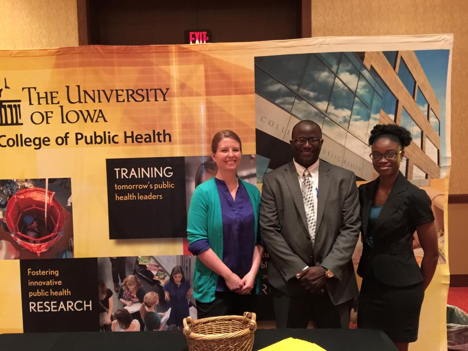 Group standing in front of College Health sign