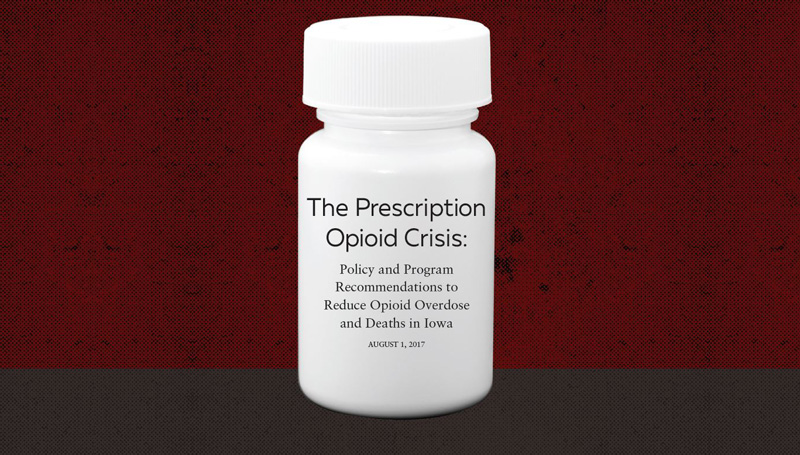 A white pill bottle with title of report