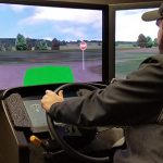 Driver in a driving tractor simulator