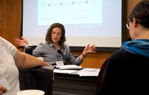 Hannah Vander Kopsa from the Crisis Intervention & Advocacy Center in Adel participates in group work at the evaluation training at the UI College of Public Health.