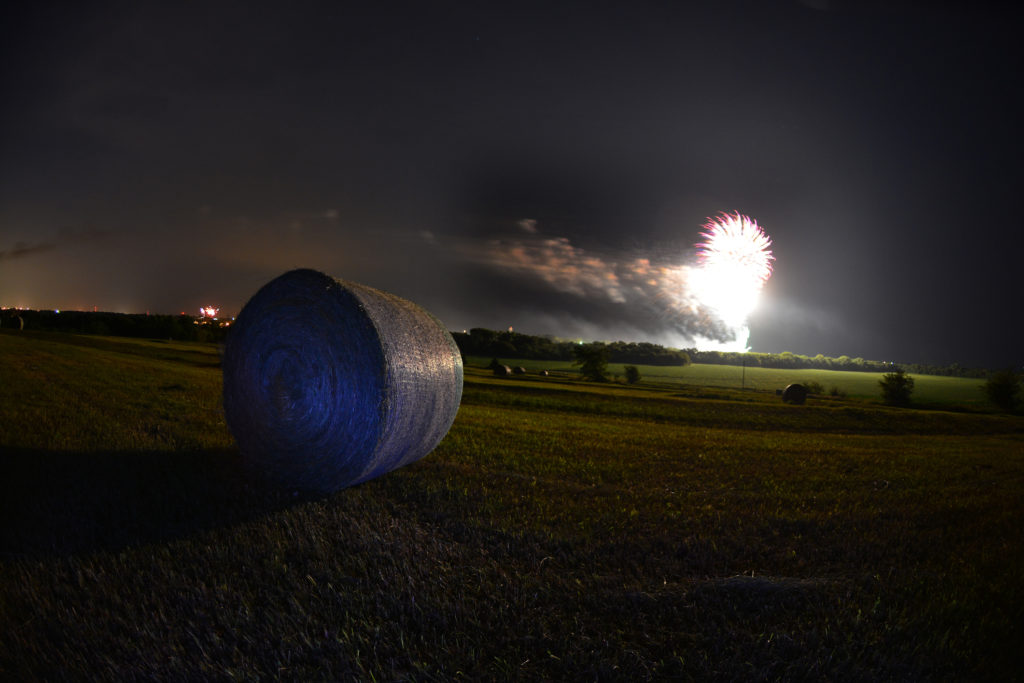 small town fireworks from the pasture hill