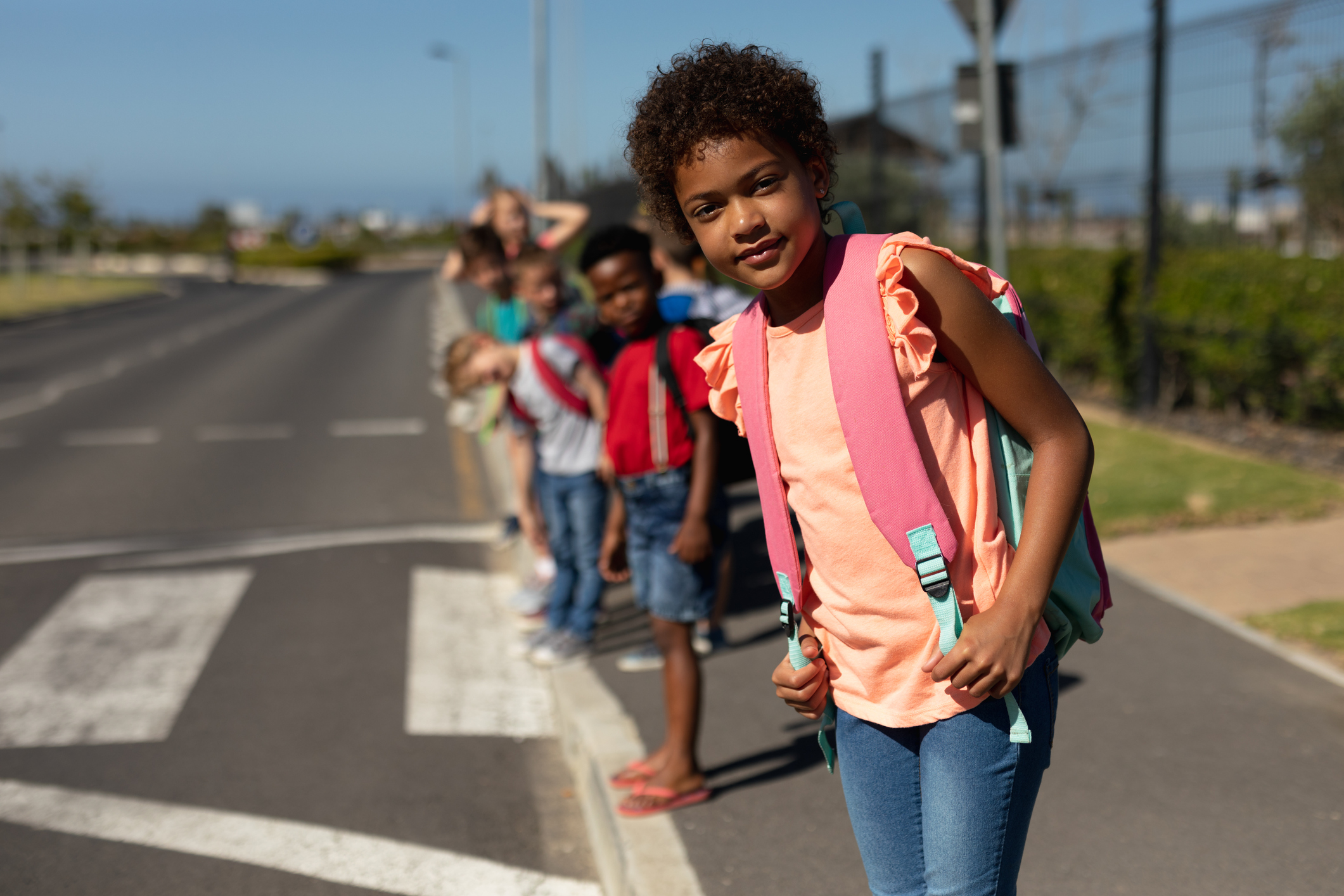 children crossing the pedestrian crossing. teaching children