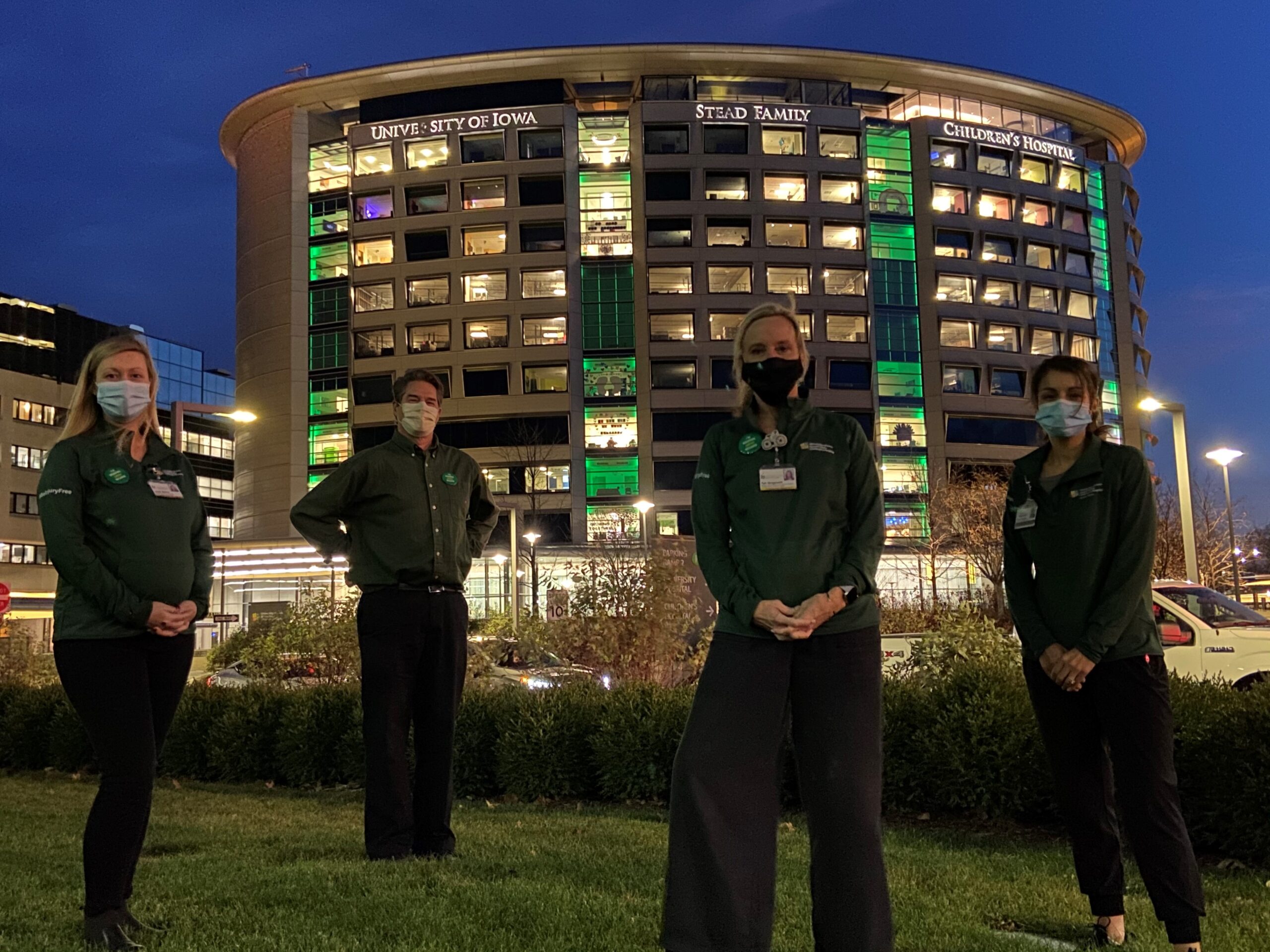 Doctors, nurses and staff from the UI Stead Family Children’s Hospital in Iowa observe the first national Injury Prevention Day November 18, 2020. Pam Hoogerwerf is pictured second from right.