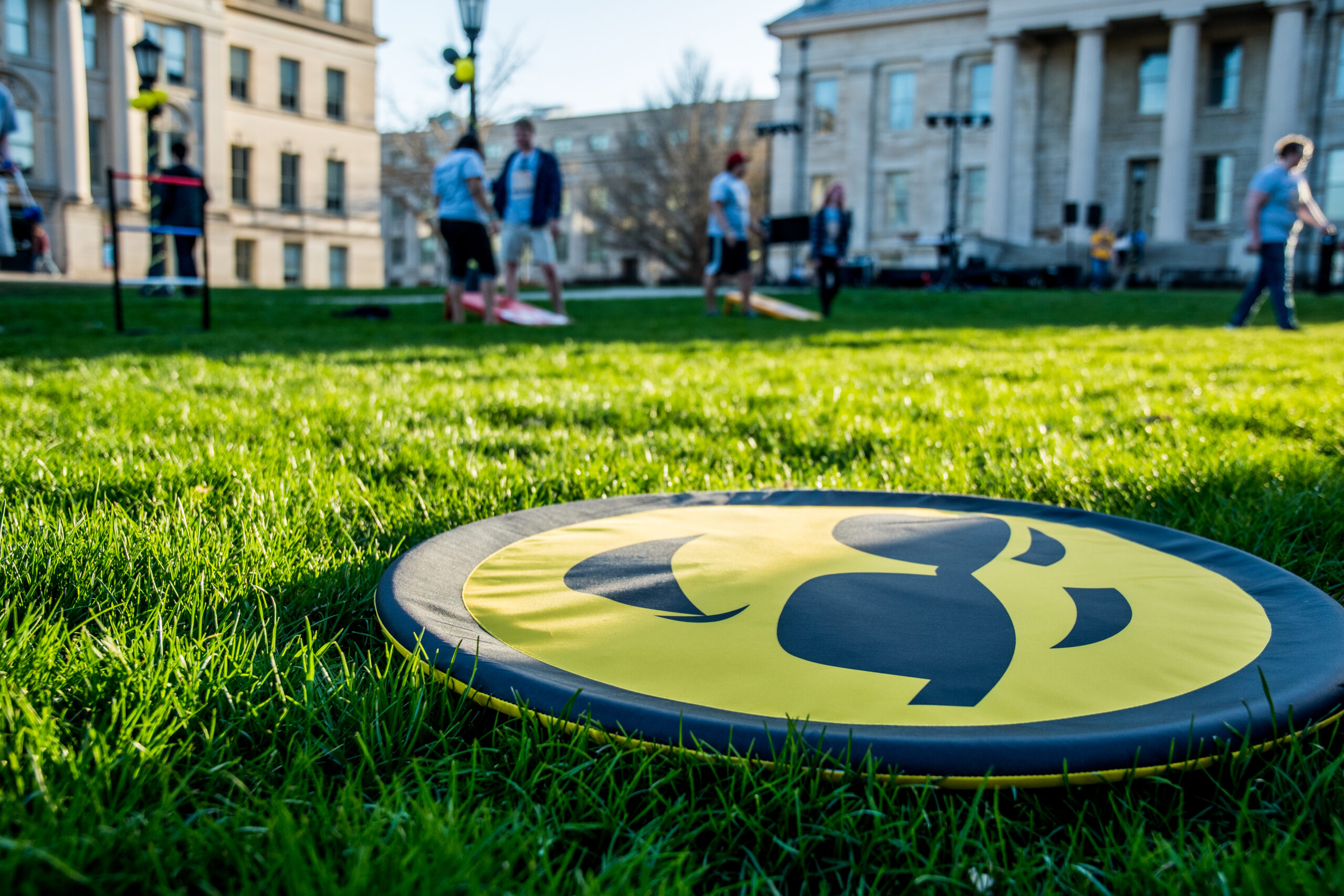 Seniors gather on the Pentacrest to play games, listen to music, and just hang out with friends.